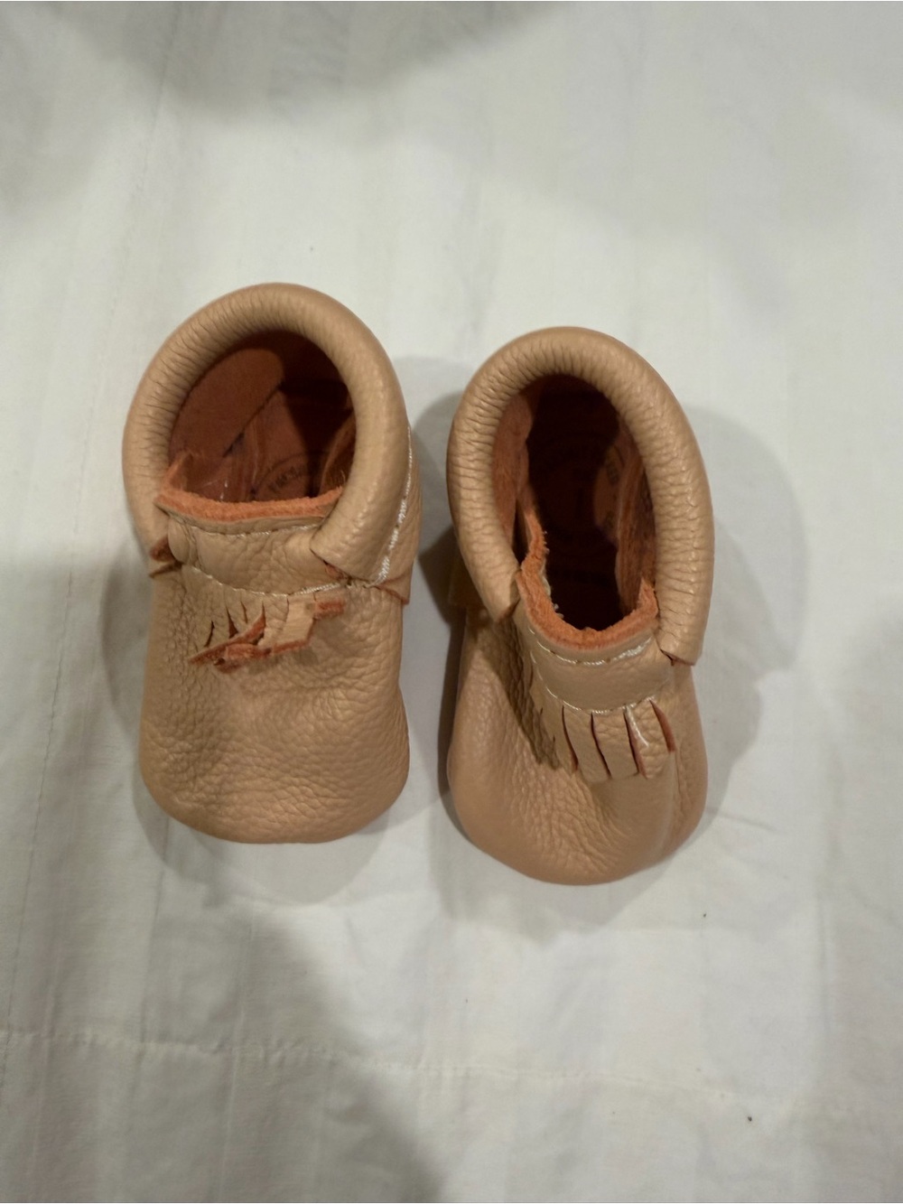 Freshly Picked Tan Moccasin Booties with Fringe Trim